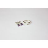 A pair of oval purple sapphire ear studs in 18ct gold; with certificate, an opal ring set with a