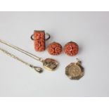 A 9ct gold carved coral ring and matching pair of studs, together with a 9ct gold locket, two 9ct