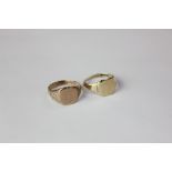 Two 9ct gold signet rings one with engraved decoration and initials the other with initials and