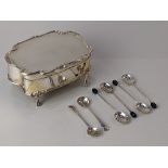 An Art Nouveau silver dressing table box, rectangular shaped hinged lid with scroll border, fitted