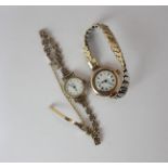 A ladys gilt metal Rotary wristwatch on 9ct gold pierced link strap, and a ladys 9ct gold wristwatch