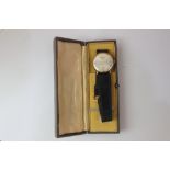 A gentleman's wristwatch by Chateau with black leather strap