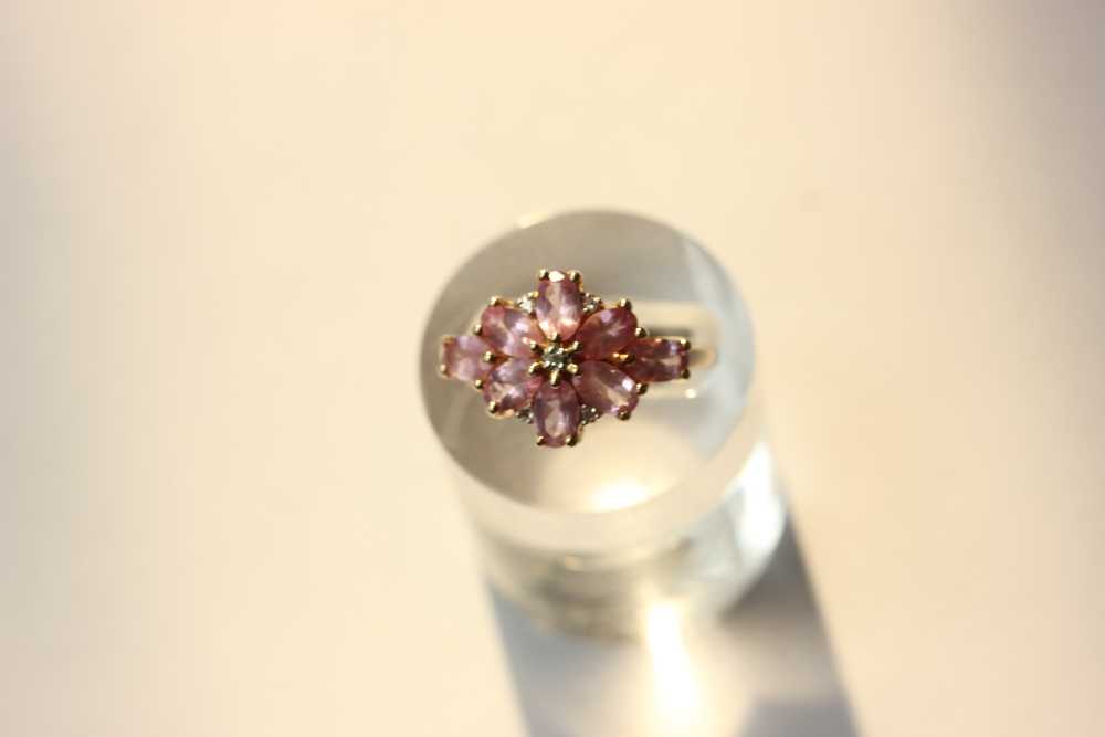 A pink spinel cluster ring