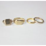 Two 9ct gold signet rings; a 9ct gold wedding ring and a 22ct gold wedding ring