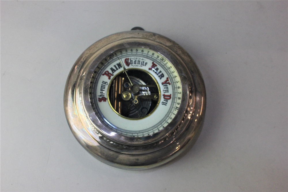 A George V silver mounted circular wall barometer hallmarked London 1927 (a/f) 14cm