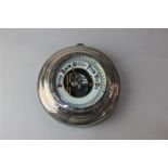 A George V silver mounted circular wall barometer hallmarked London 1927 (a/f) 14cm