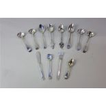 Four George III silver mustard spoons, four various teaspoons, two cruets spoons, small pickle fork,