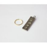 A 22ct gold wedding ring, 1.5g and a silver ingot pendant