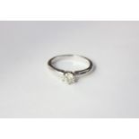 LOT WITHDRAWN A diamond single stone ring the brilliant cut stone six claw set in 18ct white gold