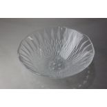 A Lalique crystal 'Vibration' bowl, with repeat design and wavy rim, 24.5cm diameter