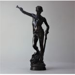 After Antonin Mercie a late 19th century bronze figure of David standing with foot on the head of