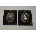 Two 19th century oval miniature portraits of a gentleman and a lady, framed as a pair, both