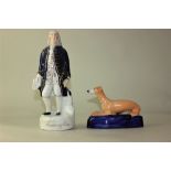 A Staffordshire pottery figure of George Washington, 25.5cm high, and a Staffordshire pottery
