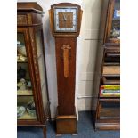 A 20th century Enfield oak cased grandmother clock, with Westminster chimes, 143cm high, with key