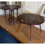 An Ercol circular drop leaf table on sloping legs (a/f) 61cm and an Edwardian Sutherland side