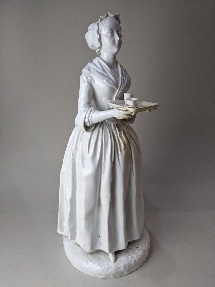 A large Meissen white porcelain figure of 'La Belle Chocolatiere', after Jean-Etienne Liotard,