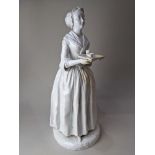 A large Meissen white porcelain figure of 'La Belle Chocolatiere', after Jean-Etienne Liotard,