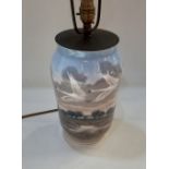 A Royal Copenhagen porcelain table lamp decorated with flying swans, 25.5cm high