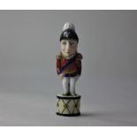 A Derby miniature porcelain novelty figure of the Duke of Wellington, 8cm high (a/f)