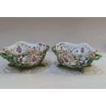 A pair of Mesissen porcelain two handled baskets pierced oval form and floral encrusted on
