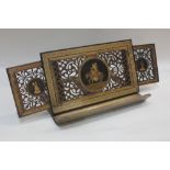 A Sorrentoware olive wood reading stand rectangular pierced shape with central marquetry panel of