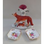 A Staffordshire pottery spill vase with a fox and cub, 19cm high, together with a pair of Royal
