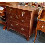 A George III oak chest of two short over two long drawers with brass handles, on bracket feet, 92cm