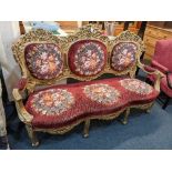 A Louis XV Revival giltwood and gesso sofa, the cresting and frame with scrolling pierced