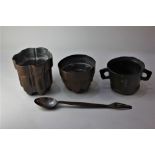 LOT WITHDRAWN Two copper jelly moulds largest 14cm, a combined spoon and fork