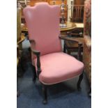 A Queen Anne style upholstered open armchair on cabriole legs