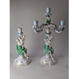 A pair of Meissen porcelain candelabra, one with missing top section, each with stem moulded with