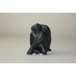 A Lalique black frosted glass figure of a seated nude 'Nu Assis Noir', 6cm high, boxed