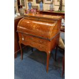 A Louis XV style gilt metal mounted cylinder bureau de dame, with a floral decorated roll-top