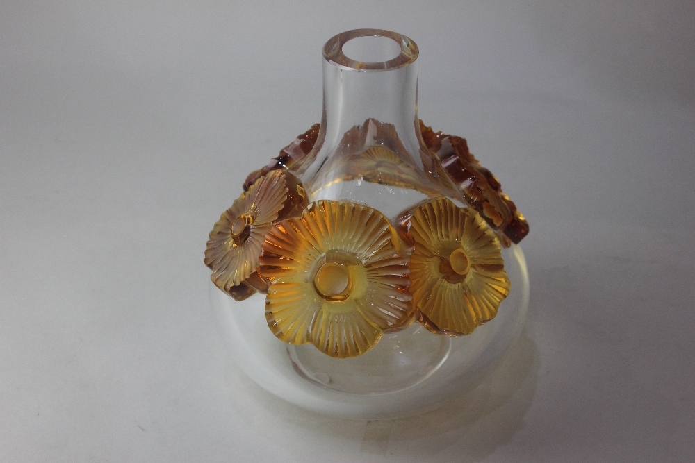 A Lalique 'Atossa' glass vase, with six raised amber coloured flowers, 20cm high