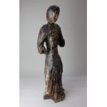 A carved wooden figure of a saint, possibly Flemish 14th century, 74cm high (a/f)