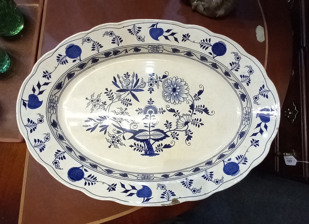 A Victorian large blue and white ceramic serving plate decorated with Onion pattern, (af) 58cm