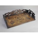 A 19th century folding book stand inlaid with geometric decoration and pierced gallery, 46cm