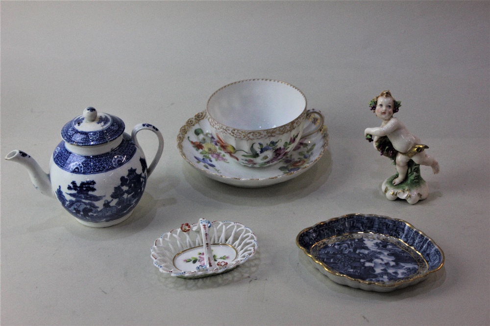 A small blue and white porcelain teapot possibly by Worcester, (a/f lid repaired) a Dresden tea