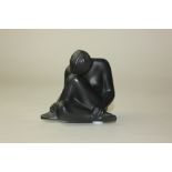 A Lalique black frosted glass figure of a kneeling nude 'Nu Feuill Pliee Noir', 4.5cm high, boxed