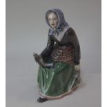 A Dahl Jensen Royal Copenhagen porcelain figure, Girl from Skovshoved of a young fisherwoman