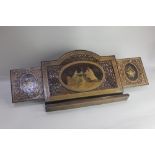 A Sorrento ware olive wood reading stand rectangular domed shape with central oval marquetry panel