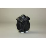 A Lalique black frosted glass figure of a seated nude 'Nu Nabhi Noir', 6cm high, boxed