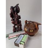 A Chinese carved hardwood figure of a fisherman, 36.5cm high, a reproduction scroll after Sesshu