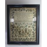 A 19th century alphabet verse sampler worked by Margaret Duberley aged 11 years, in glazed frame