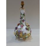 A Dresden porcelain bottle shaped vase (converted to a table lamp), decorated with figures in a