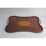 An Edwardian inlaid two handled serving tray with central shell design (a/f) 58cm