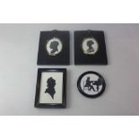 Three 19th century portrait silhouettes, of two ladies and a young man wearing a cap, largest 11.5cm