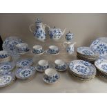 A matched collection of Meissen porcelain onion pattern tea and table wares, to include teapot, milk