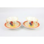 Two Staffordshire Chelsea Works Burslem 'Crocus' pattern tea cups and saucers