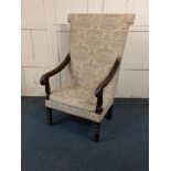 A Georgian style open armchair, with floral upholstered back and padded seat, with scroll arms on